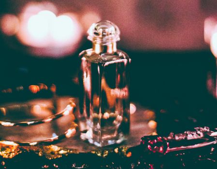 Perfume bottles and vintage fragrance at night, aroma scent, fragrant cosmetics and eau de toilette as luxury beauty brand, holiday fashion parfum design