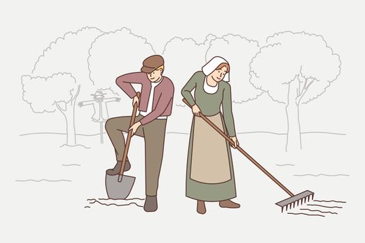 Old-fashioned people working in field . Vector Old-fashioned people in traditional clothes working in garden together. Old couple in ancient way do agriculture outdoors. Vector illustration.