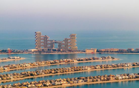 Dubai, UAE - 09.24.2021 Partial view of man made island, Palm Jumeirah and Royal Atlantis hotel. Urban