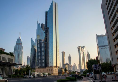 Dubai Financial Center road. Address Sky view hotel, Dusit Thani hotel and Burj Khalifa tallest building in the world can be seen on the scene.