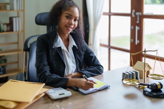 Portrait of African Americans female lawyer at work at office her