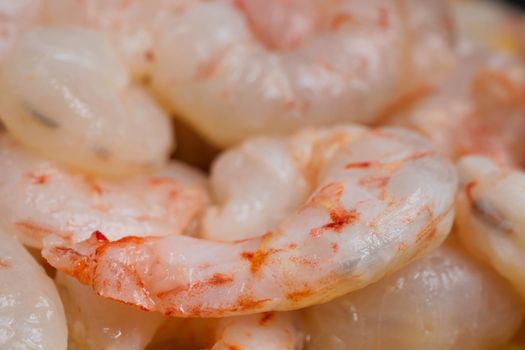 close up of raw king prawn on table.
