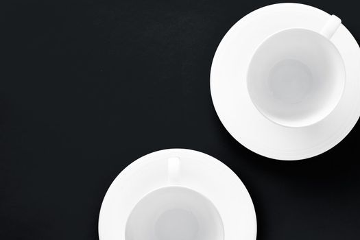 White tableware crockery set, empty cup on black flatlay background