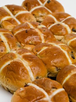 Heavenly hot cross buns. Studio shot of freshly baked hot cross buns.