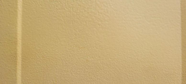 light brown background on wall panel