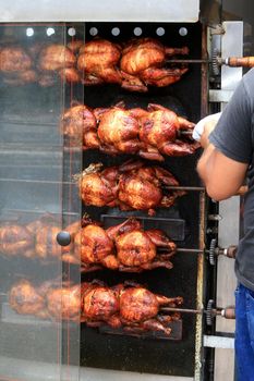 roast chicken in a street restaurant