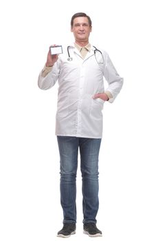 Happy doctor holding business blank card and smiling at camera