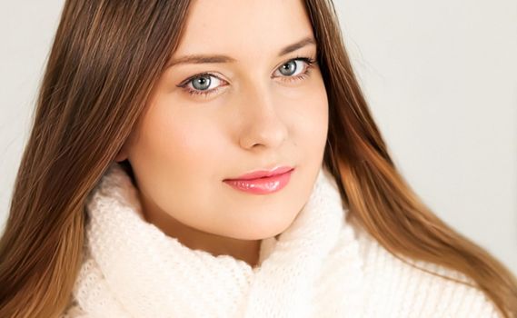 Autumn winter fashion and knitwear, beautiful woman wearing warm knitted scarf