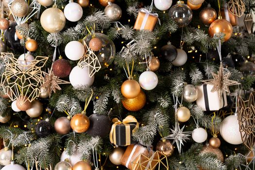 Christmas tree decoration close up background. Garland, balls, illuminated lights