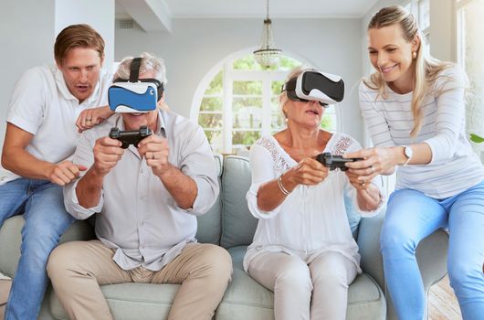 Futuristic family with video game VR or virtual reality glasses in home with couple helping senior people. Metaverse, future games and elderly people play ai 3D simulation software app together