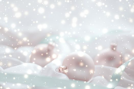 Christmas decoration with shiny snow on silk background, holiday season