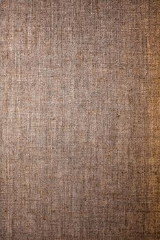 Decorative brown linen fabric textured background for interior, furniture design and art canvas backdrop