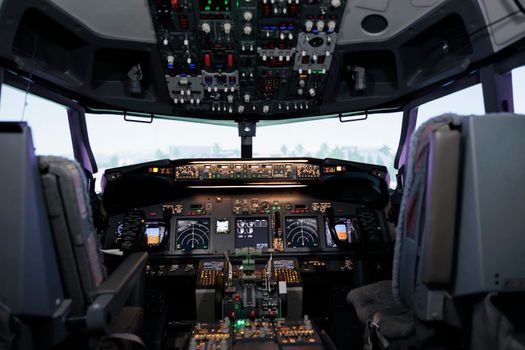 Nobody in empty airplane cockpit with dashboard command
