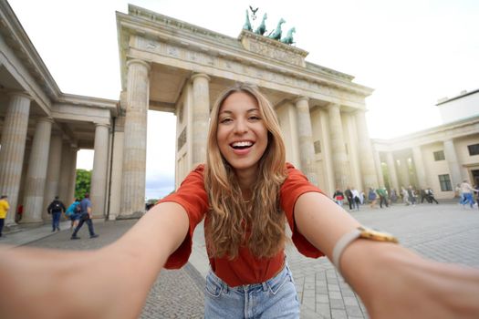 Self portrait of beautiful excited school exchange girl visiting Europe within the exchange program