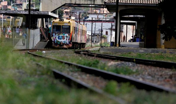 salvador, bahia / brazil - november 23, 2015: suburban train is seen passing through the Lobato neighborhood in the city of Salvador.
