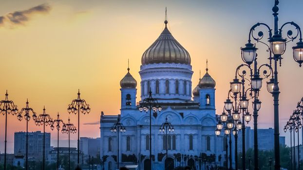 Christ the Savior Cathedral and street lights at sunrise, Moscow, Russia