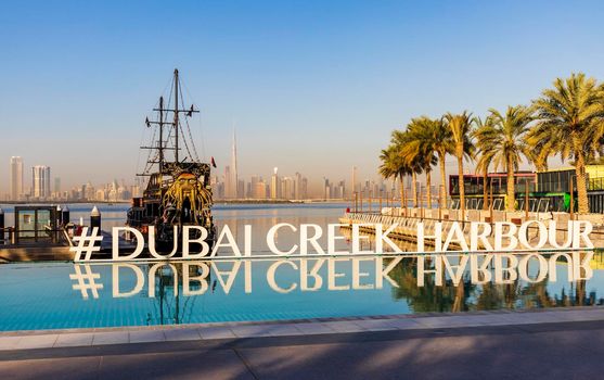 Dubai, UAE - 02.11.2022 - Replica of Black pearl pirate ship, used as a floating restaurant and docked in Dubai creek harbor. City