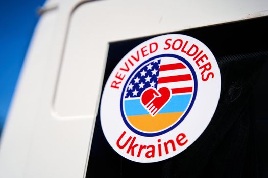 Stickers on trucks with humanitarian aid to Ukraine