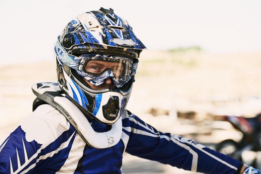 Ready to take on anything. Portrait of a young motocross rider.