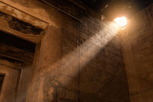 Sunbeam entering through a breach in an Egyptian temple