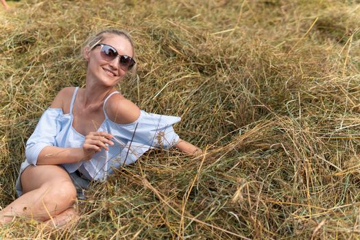 Travel portrait girl happy fashion sunglasses field hay countryside, for happiness woman from adventure for denim bale, contemplation youth. Full wild enjoy, sky