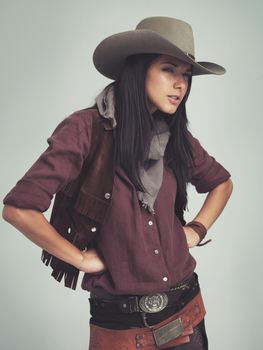I wasnt lying...You just didnt ask the right question...an attractive young woman in cowboy attire.