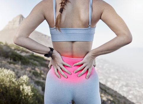Lower back pain, sports injury and woman holding sore body part after training, exercise and workout with glowing red sportswear. Runner, sports female and athlete outside for fitness and relief