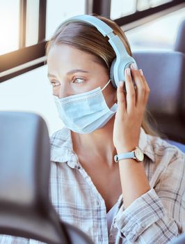 Covid, face mask or headphones on woman in bus for city travel, public transport or location commute. Thinking, fashion or relax student in virus compliance listening to podcast, radio or music audio.