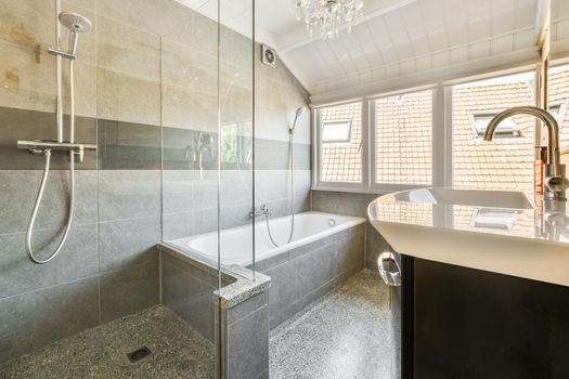 Modern shower in bathroom in apartment