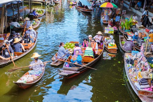 People at Damnoen saduak floating market, Bangkok Thailand September 2022. colorful floating market in Thailand
