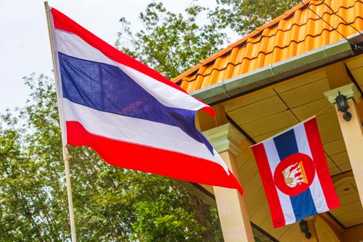 Thai flag red white blue colors in Phuket Thailand.