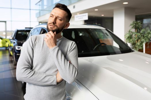 the buyer seriously thought about buying a new car in the showroom of a car dealership