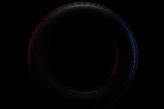 round black tire on a black background