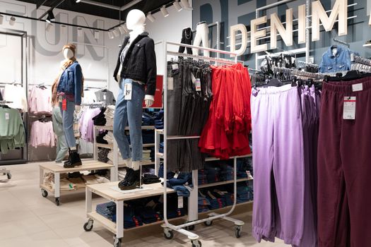 showcase of a store selling stylish denim clothing