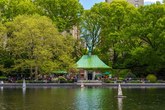 Miniature remote-controlled sail boat in Conservatory Water pond in the Central Park, New York