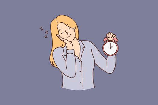 Sleepy woman with clock