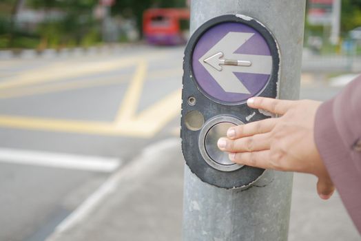 close up of crossing signal button in singapore