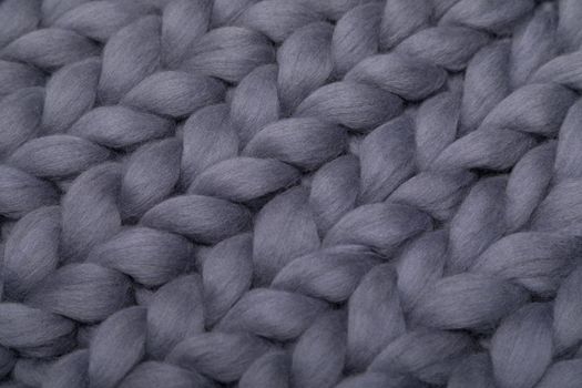 blanket made of natural sheep wool close-up gray