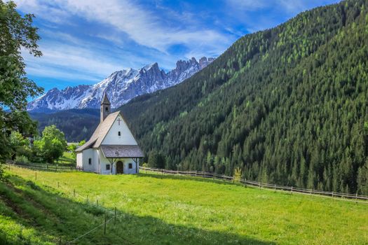 Alpine Church, chapel in Dolomites alps near Bolzano, Italy