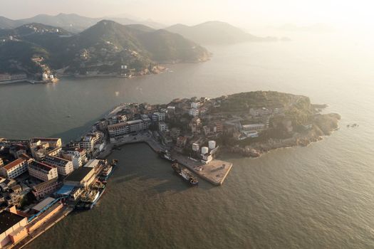 Seaside port with residental houses around, in Taizhou, Zhejiang.