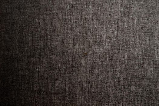 Decorative dark linen fabric textured background for interior, furniture design and art canvas backdrop