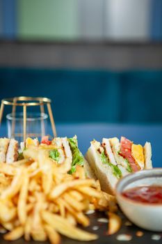 Club Sandwich with french fries