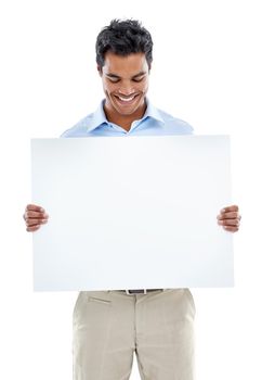 How do you like this idea. Studio shot of a young man holding a blank card for copyspace isolated on white.