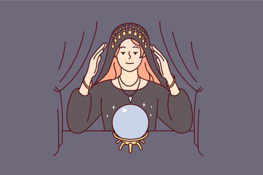 Female fortune teller with magic ball