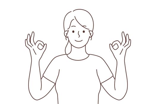 Smiling woman with mudra hands meditating