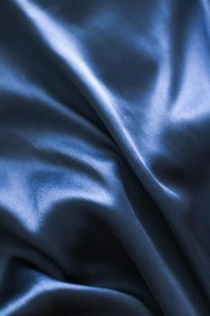 Luxury dark blue soft silk flatlay background texture, holiday glamour abstract backdrop