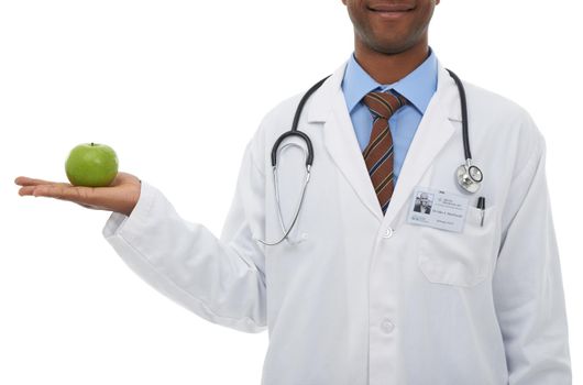 This is meant to keep doctors away...a doctor holding an apple.