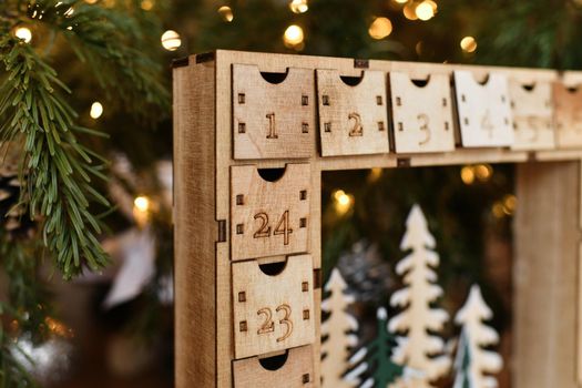 A wooden advent calendar for a Christmas