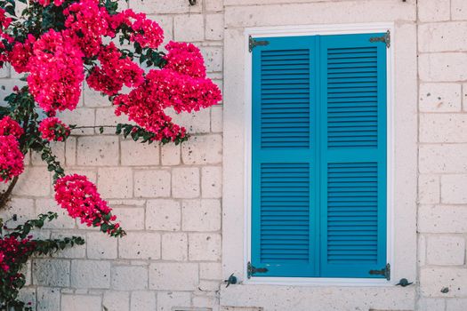 old Greek shutter window at a Greek village