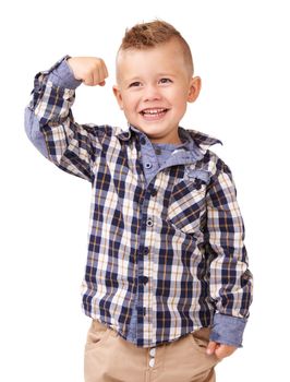 Im superman. An adorable little boy flexing on a white background.